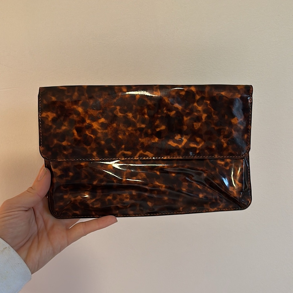 Patent clutch - revolve - never used